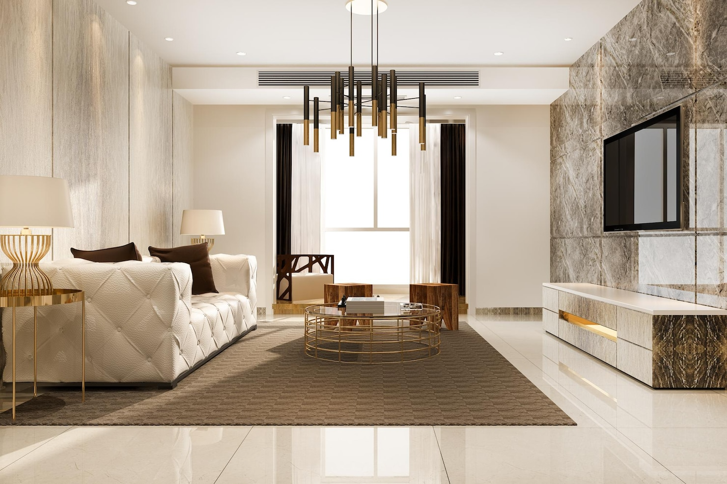 Modern living room with a white sofa, TV, and geometric chandelier.