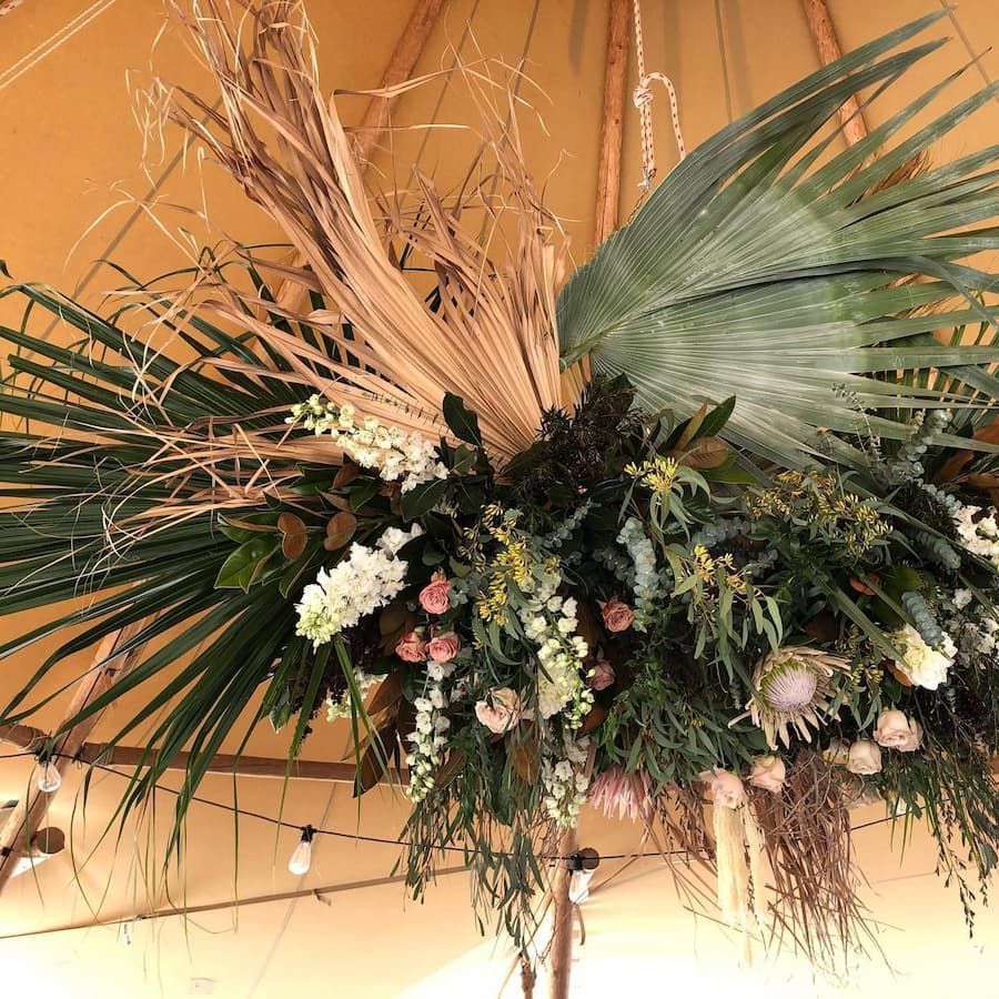 A Hanging Arrangement of Flowers and Leaves — Suncoast Flowers in Buderim, QLD