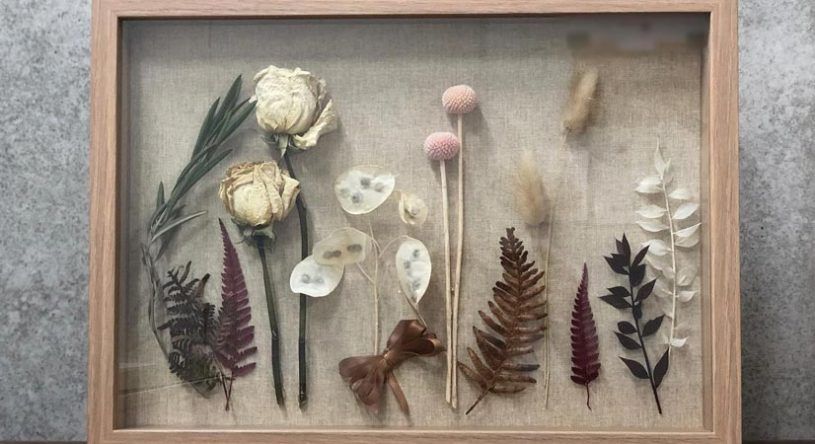 A Picture Frame Filled With Dried Flowers and Leaves — Suncoast Flowers in Birtinya, QLD
