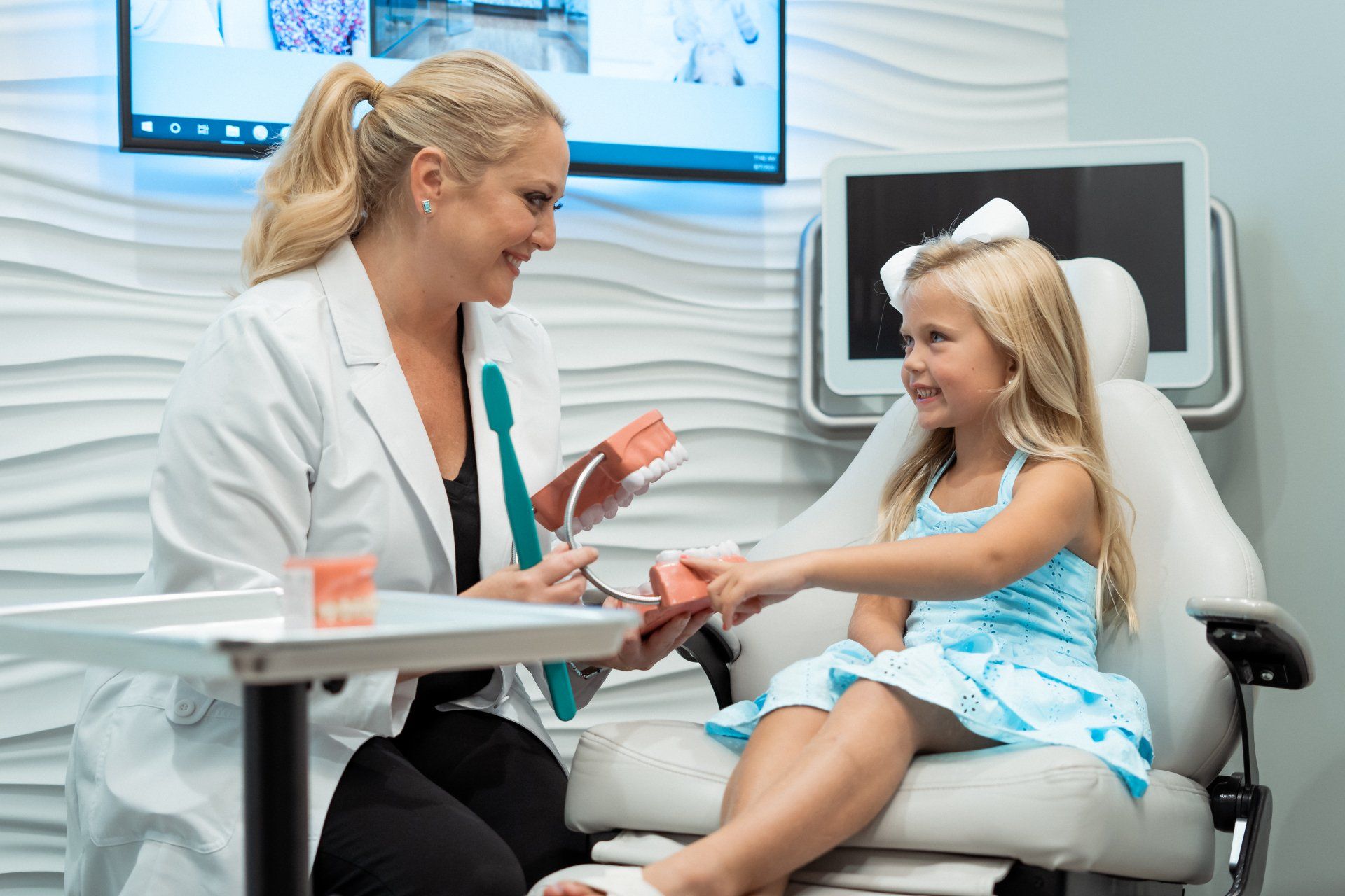 Small child learning about orthodontics