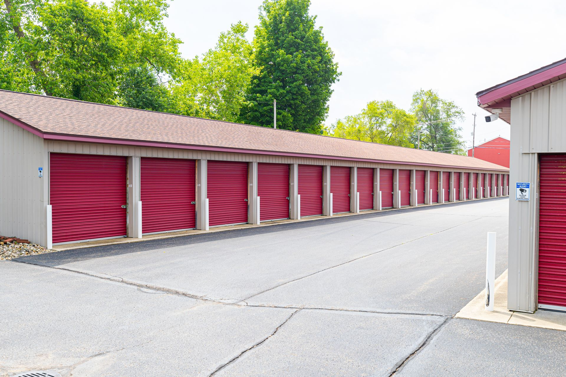 Rows of red drive up storage units at Plainwell Self Storage, 1177 M-89 in Plainwell, Michigan
