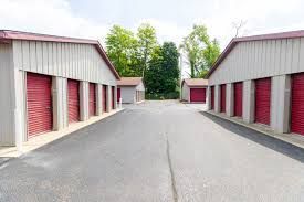 Paved drive aisle between storage buildings at Plainwell Self Storage on M-89