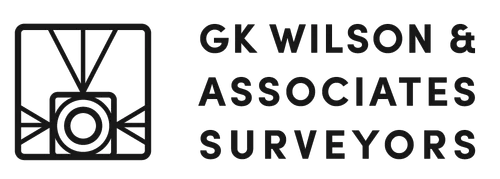 Logo for GK Wilson & Associates Surveyors in black and white with a geometric emblem.