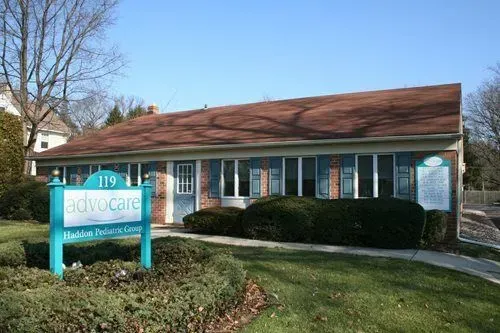 A low, brick building with the sign 