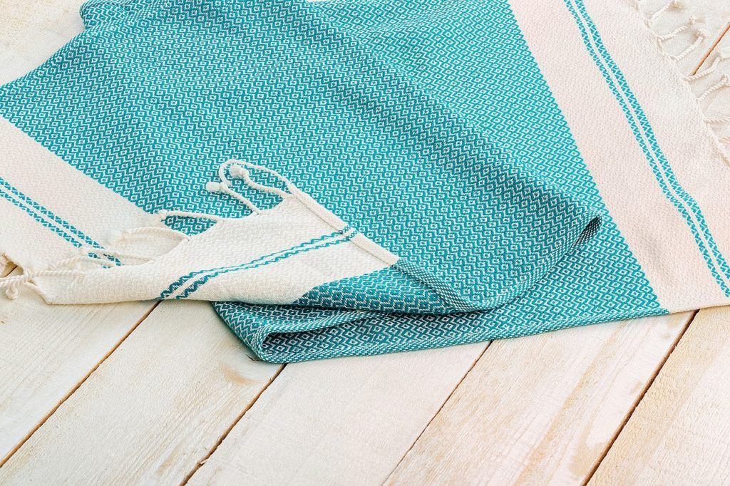 Turkish towel on wood floor