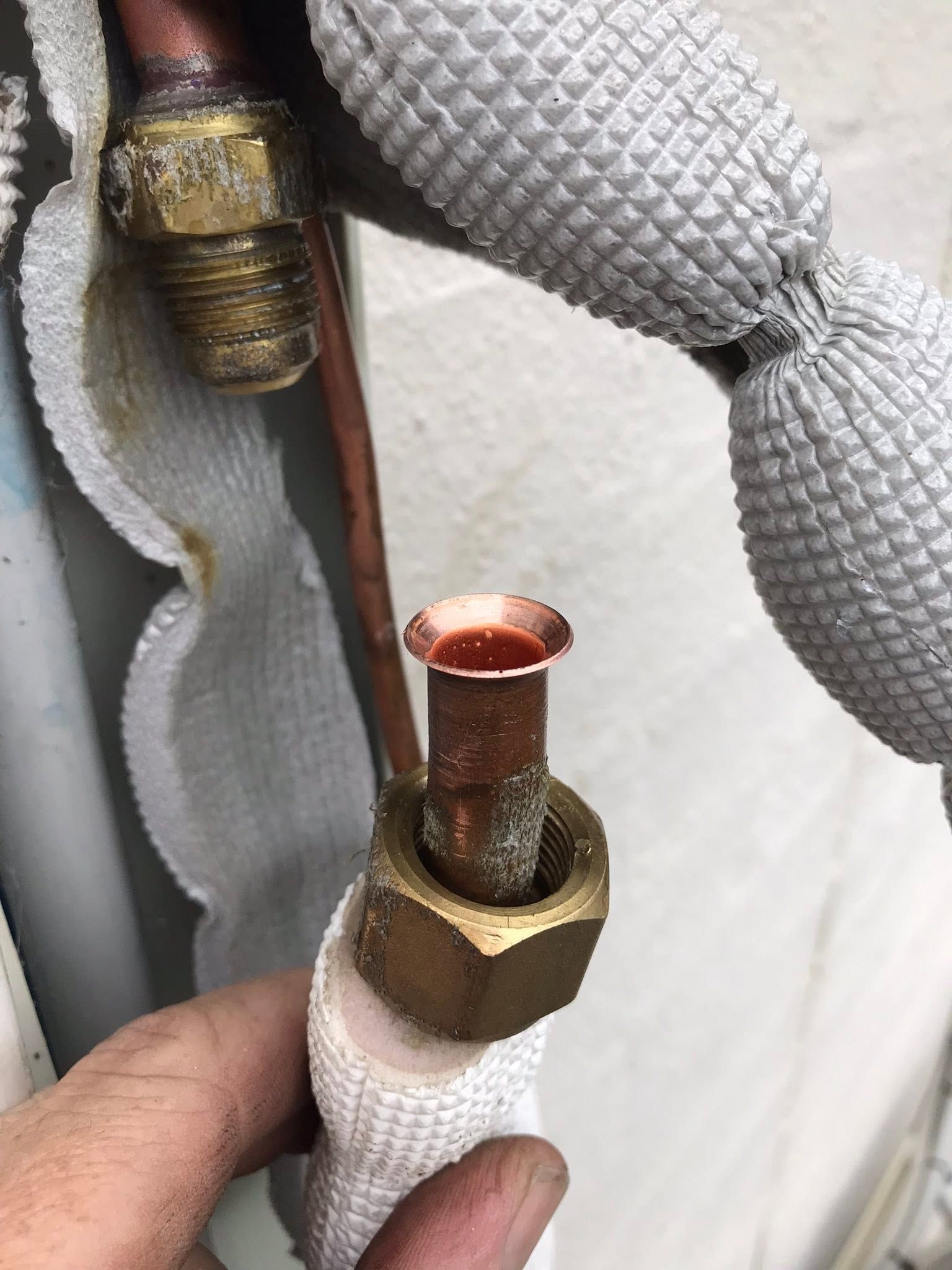 Close-up Of Insulated Copper Pipe Ends With Brass Fittings — Escarpment Air in Nowra, NSW