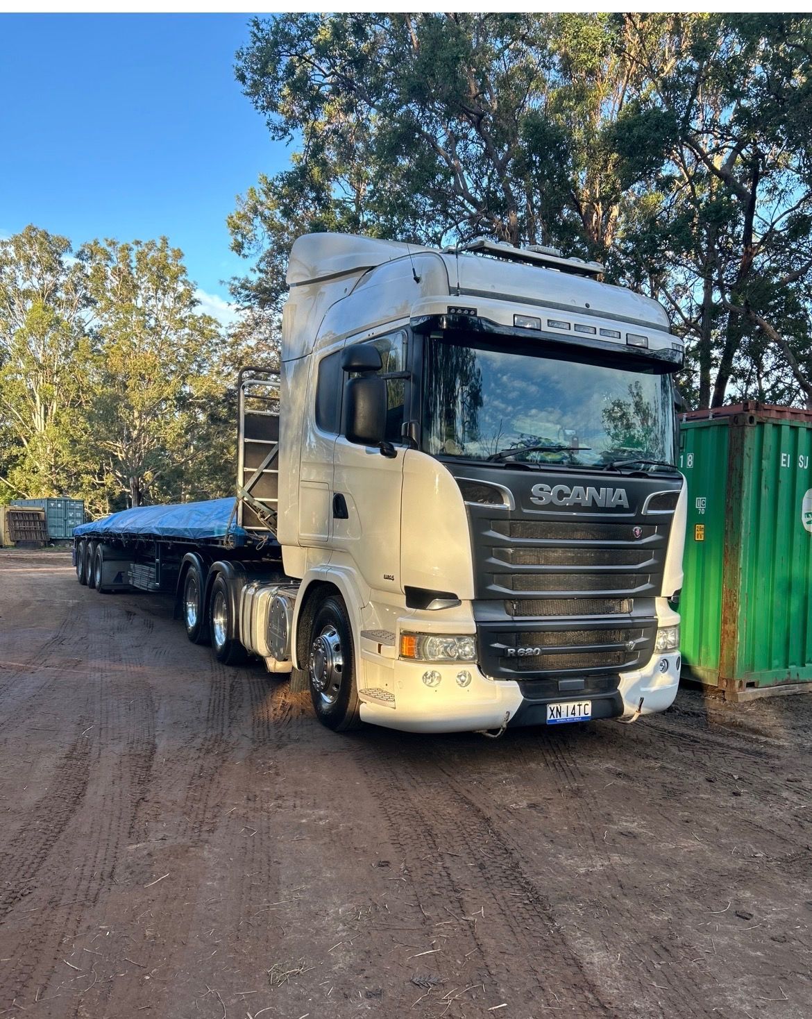 White Scania Semi-truck With Blue Flatbed Trailer Parked — Western Pacific Operations in Kremnos, NSW