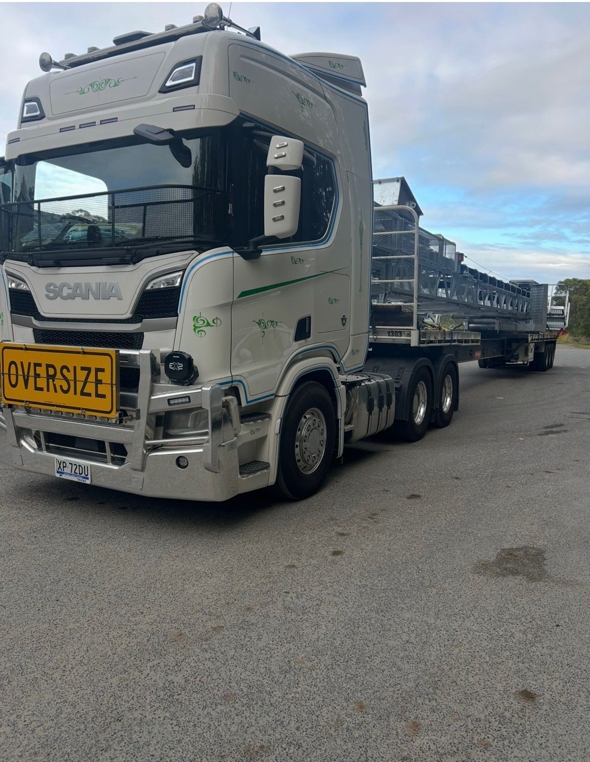 White Scania Semi-truck Hauling a Flatbed Trailer — Western Pacific Operations in Kremnos, NSW