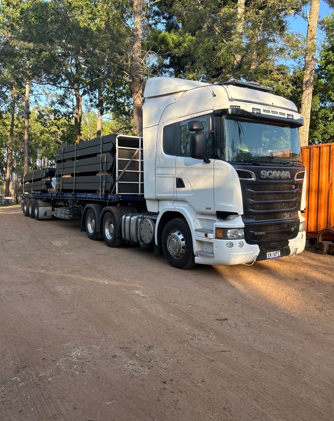 White Semi-truck With Black Cargo Trailer Parked — Western Pacific Operations in Kremnos, NSW