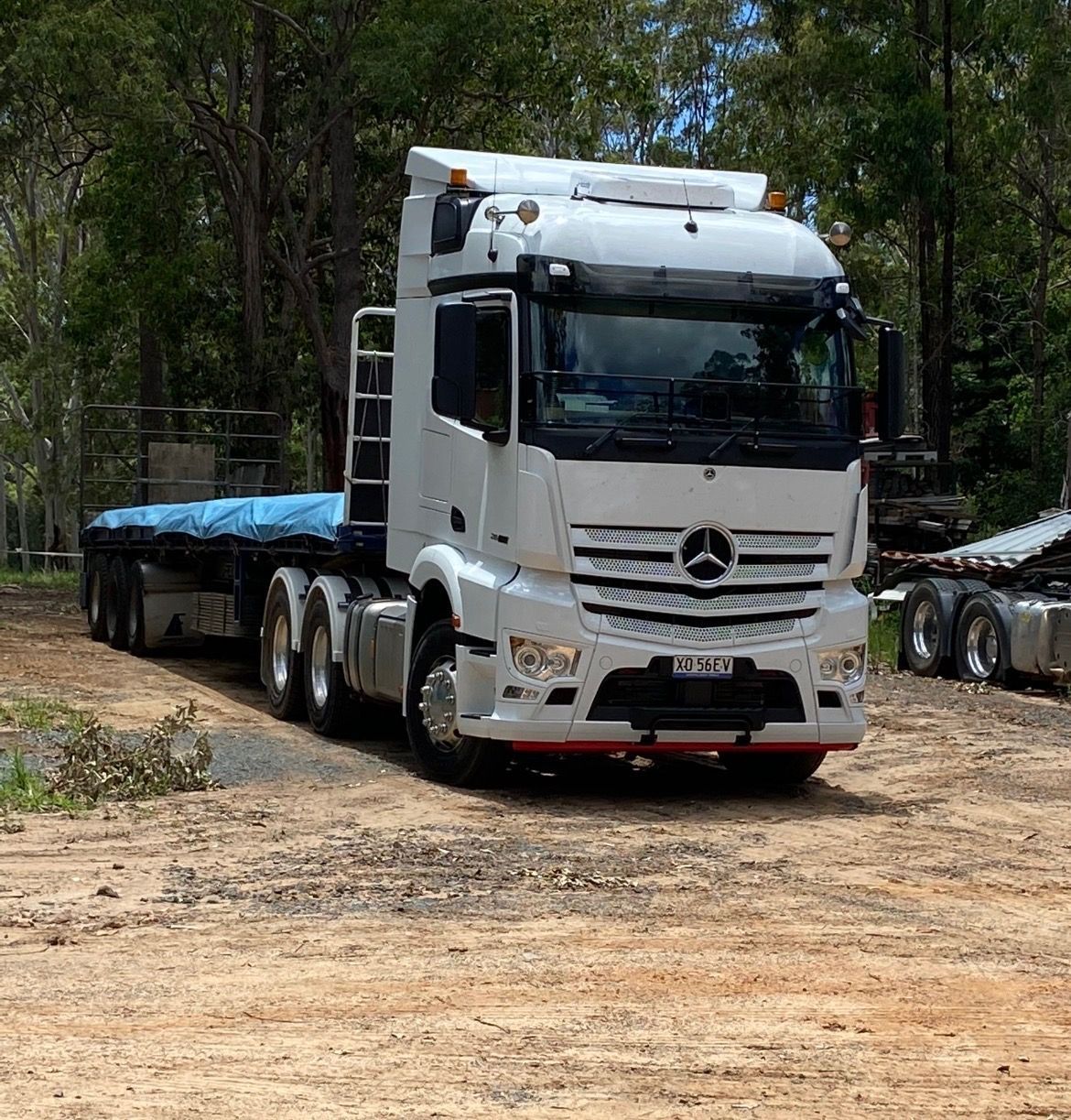 White Mercedes Truck Parked on a Dirt Road Beside Trees — Western Pacific Operations in Kremnos, NSW