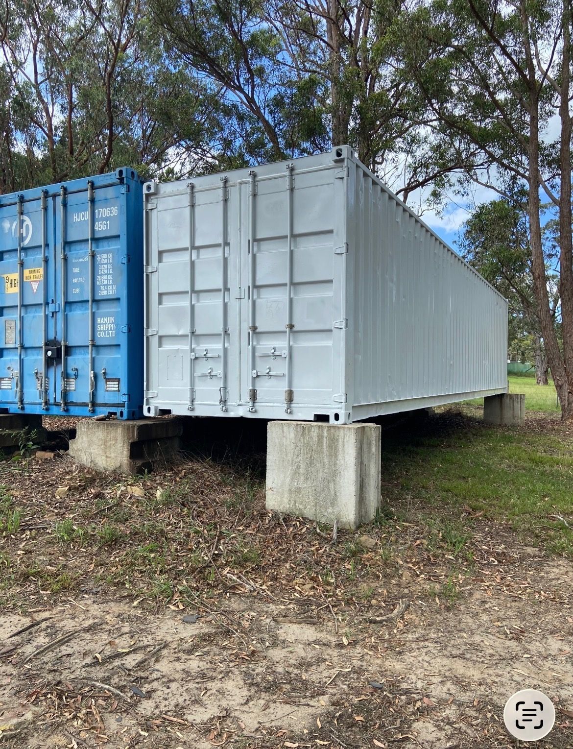 White Shipping Container on Concrete Blocks  — Western Pacific Operations in Kremnos, NSW