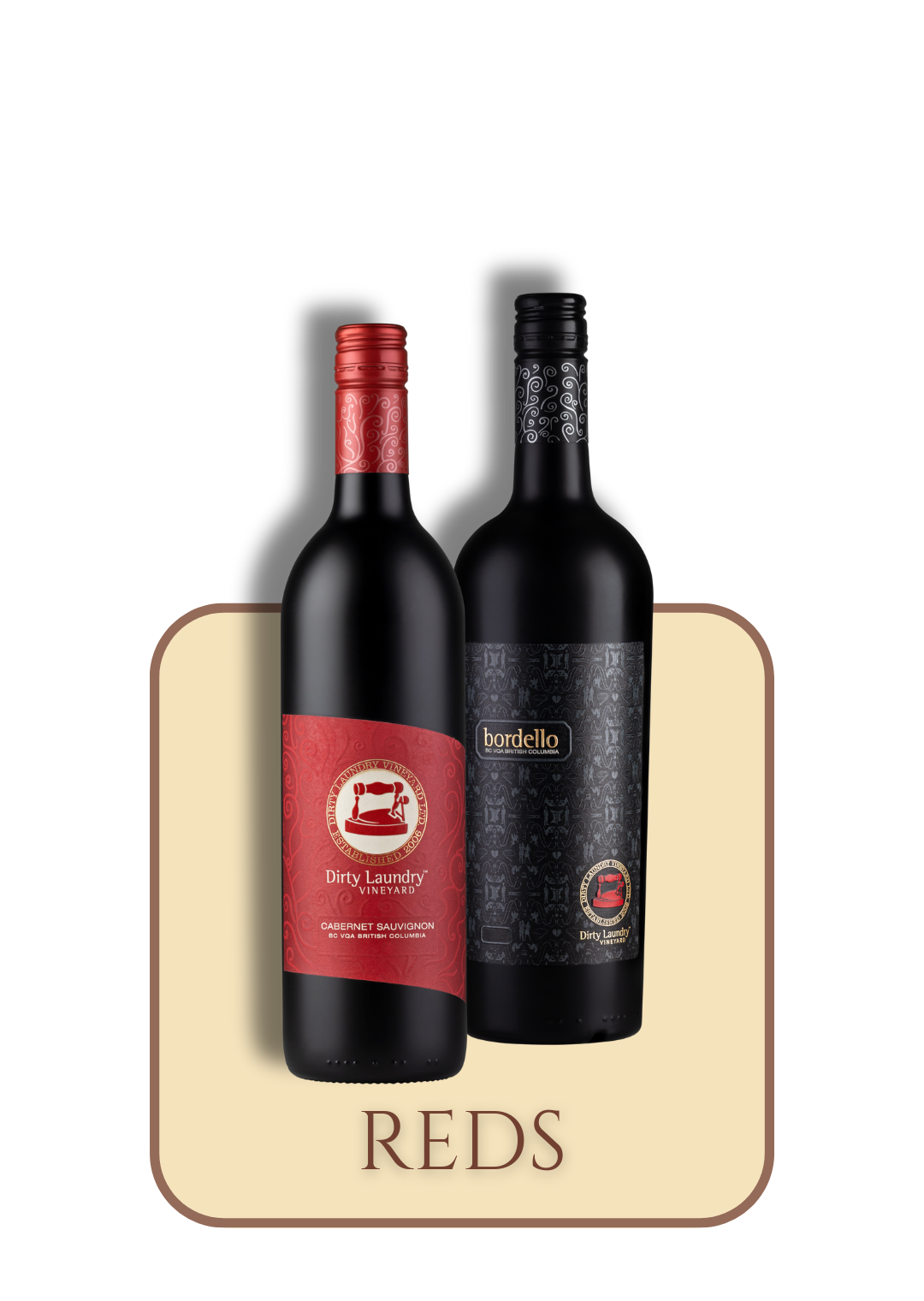 Two bottles of red wine are sitting next to each other on a table.