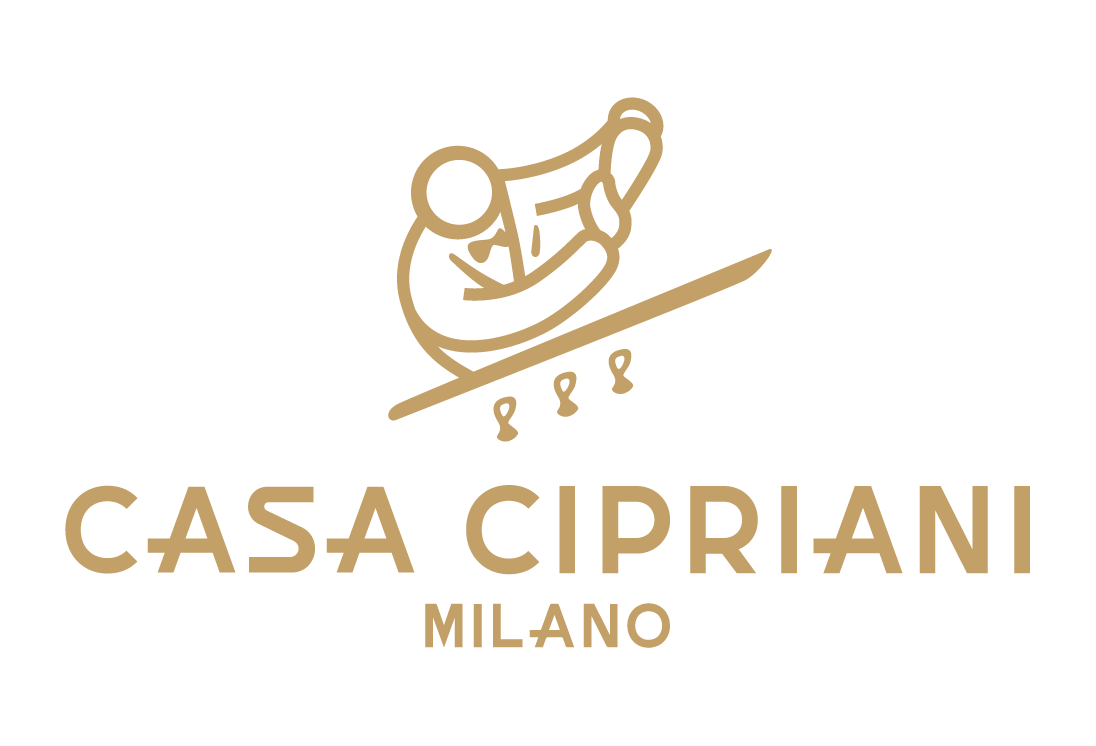 The logo for casa cipriani milano shows a person riding a sled down a hill.