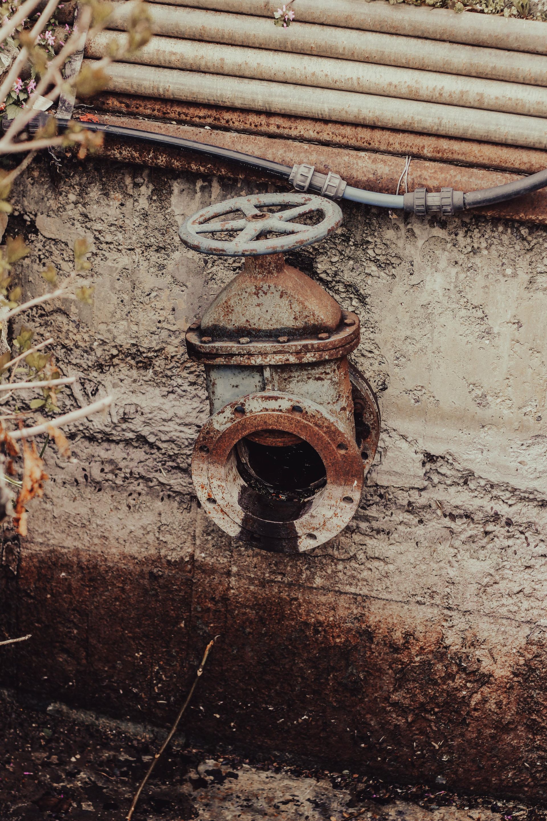 Old sewer outlet ready for pipe replacement by Castle Rock Plumbing in Colorado