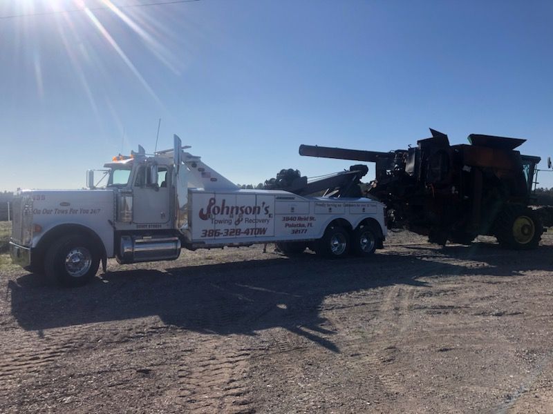 Tow Truck with White Truck — Palatka, FL — Johnson's Towing Tow Truck with White Truck — Palatka, FL — Johnson's Towing