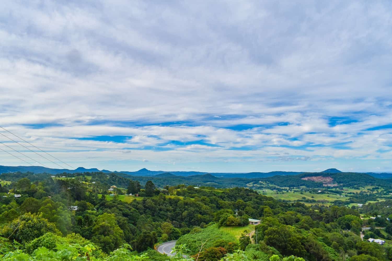 a View of a Lush Green Valley With Mountains — CM Removals & Transport In Sunshine Coast, QLD