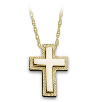 A gold necklace with a white cross pendant
