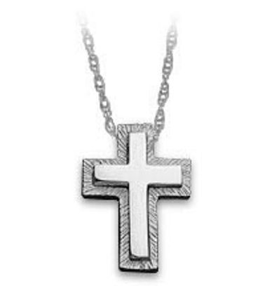 A silver cross pendant on a chain on a white background.