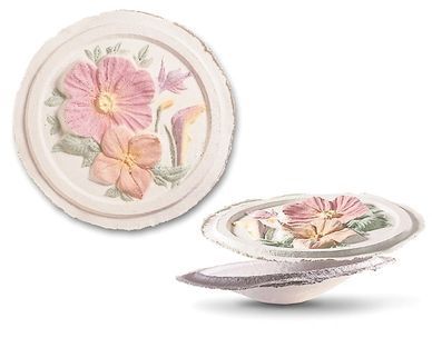 A white plate with pink flowers on it