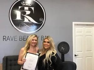 Two women holding certificate | Sylmar, CA | Rave Beauty Bar