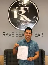 Man holding certificate | Sylmar, CA | Rave Beauty Bar
