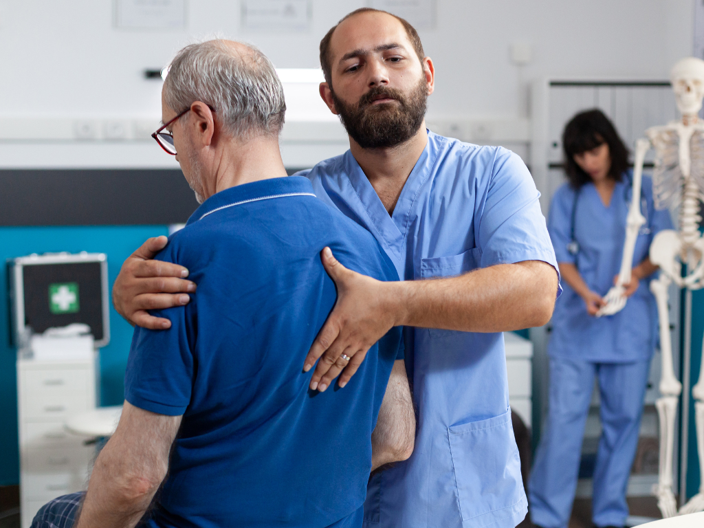 Orthopedic specialist examining a patient's shoulder at Gangnam Nanoori Hospital
