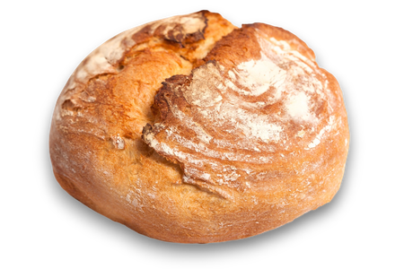 Pagnotta rotonda di pane rustico con crosta dorata e spolverata di farina bianca.