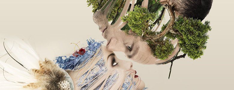 A double exposure of a woman 's face with trees on it.