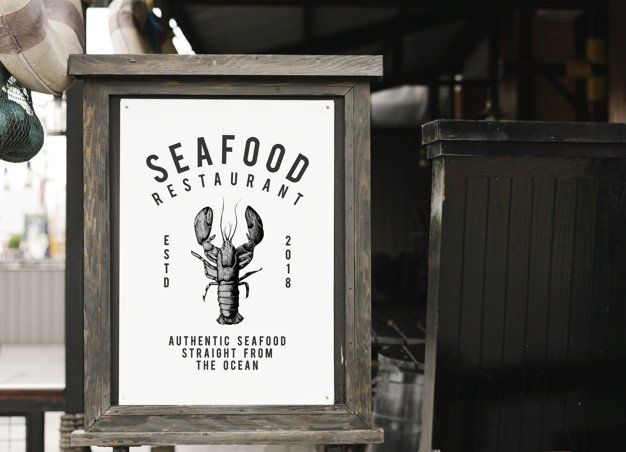 A seafood restaurant sign with a lobster on it