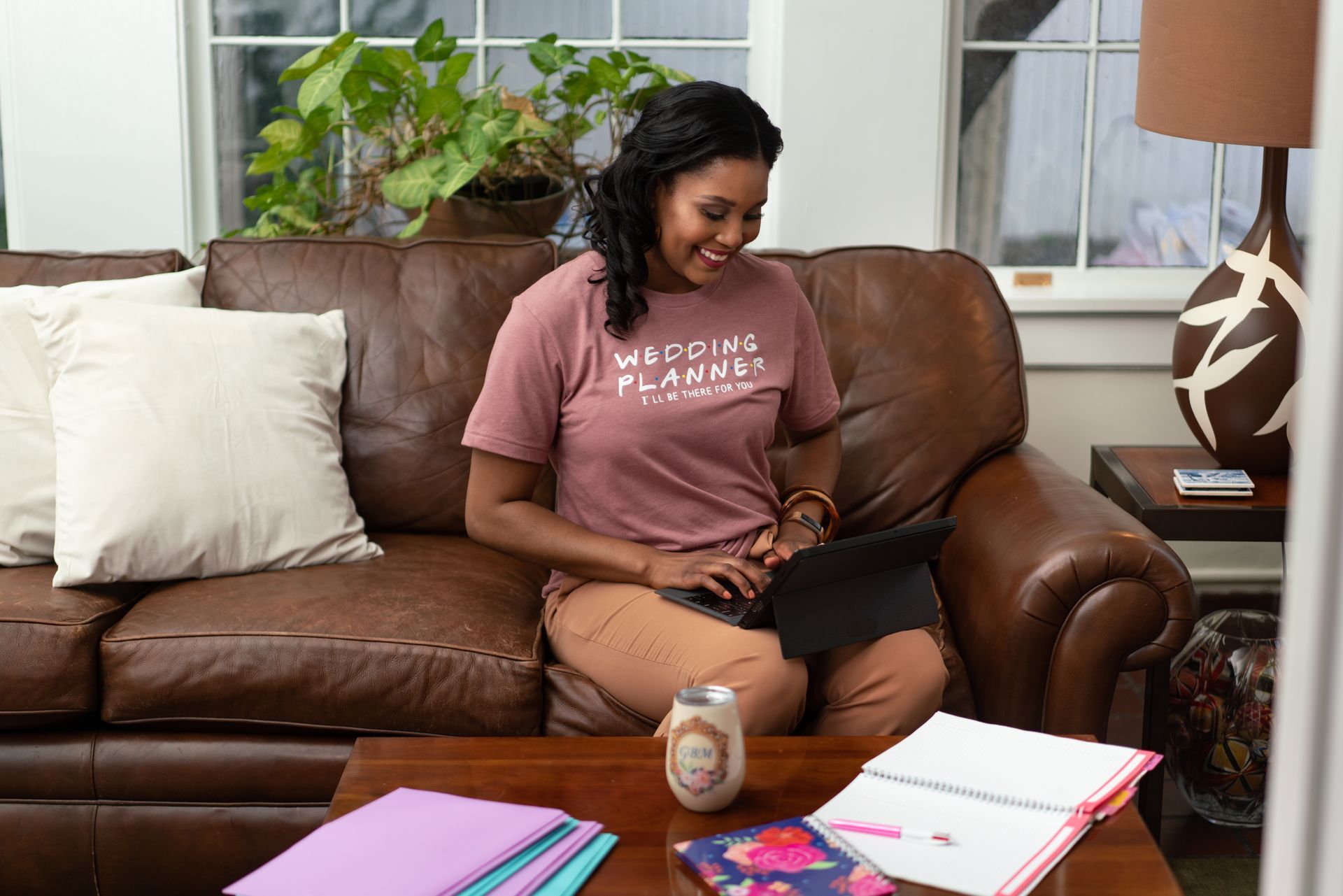 West Virginia Wedding Planner working on computer for clients