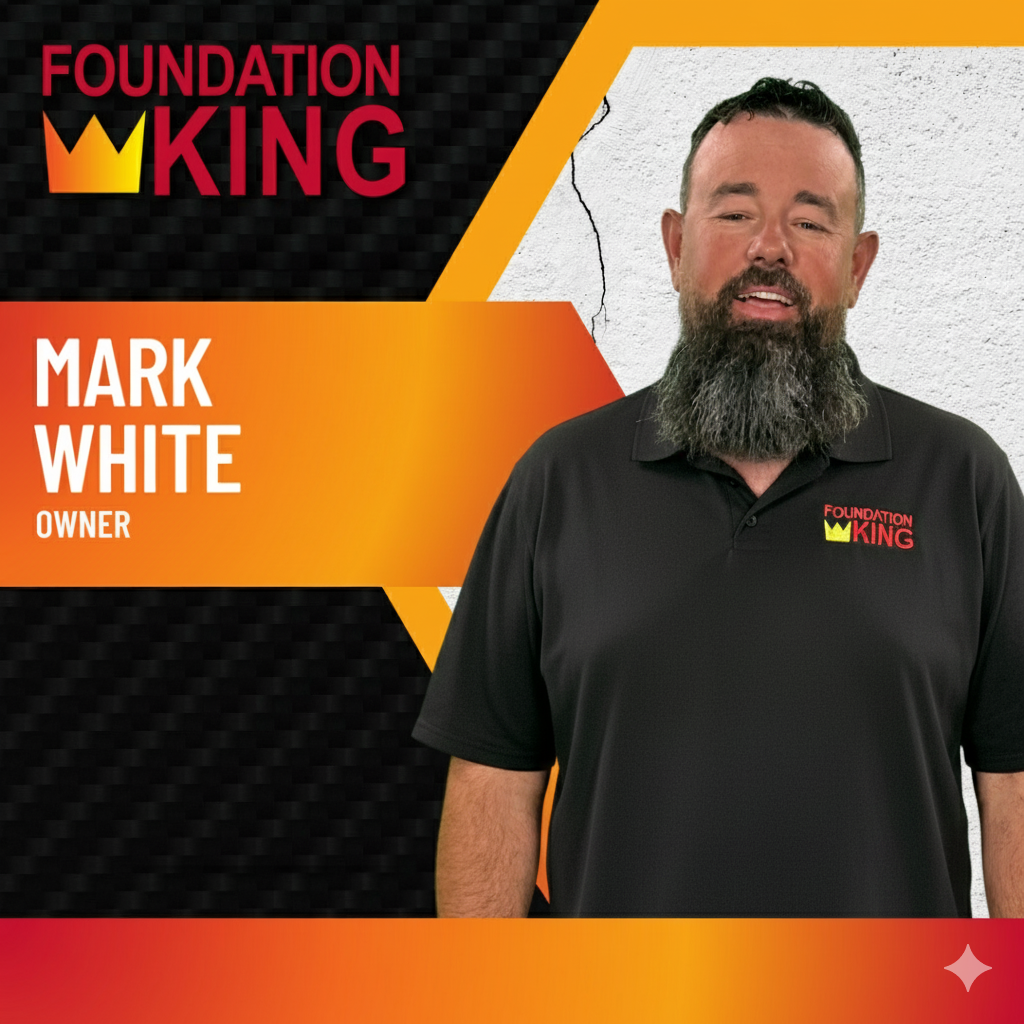 Foundation King employee Mark White, owner, standing against orange and black branded background.