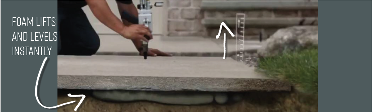 A person is kneeling down on a concrete surface with a hammer.