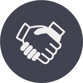 Two white hands shaking on a dark gray circular background, symbolizing agreement.