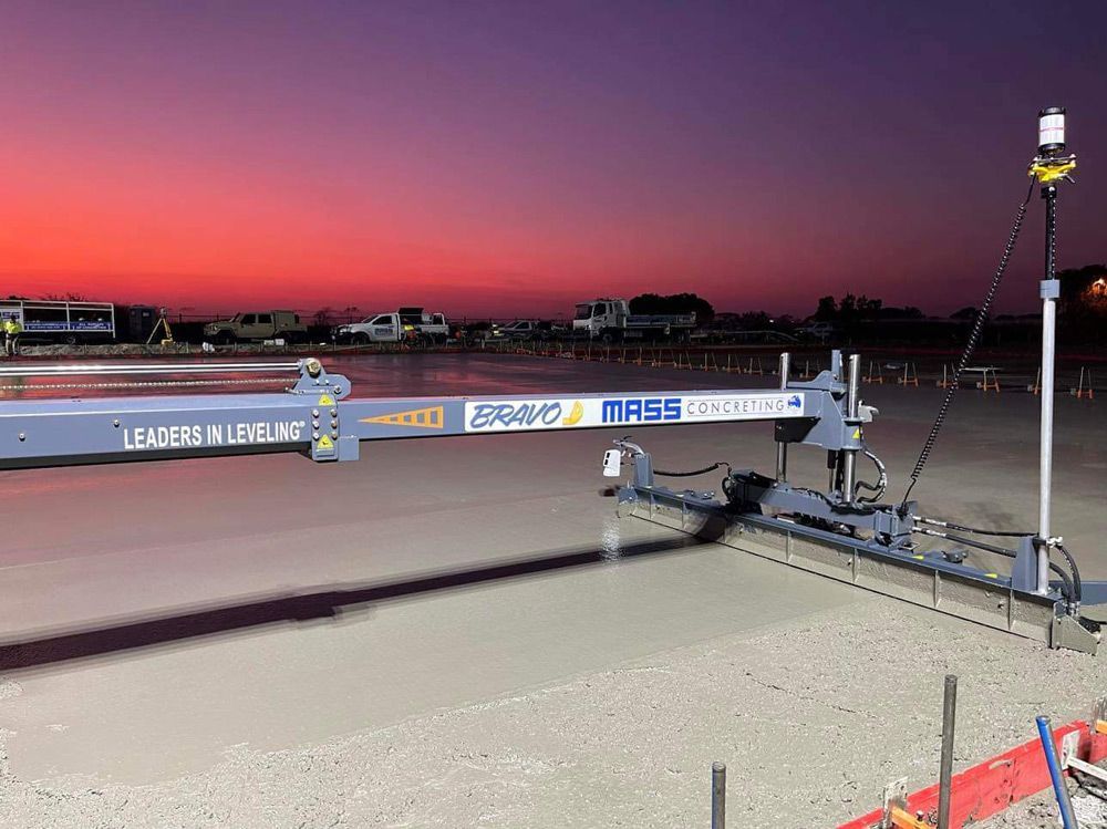 A Machine Is Sitting on Top of A Concrete Surface — Mass Construction Group Australia Pty Ltd in South Mackay, QLD