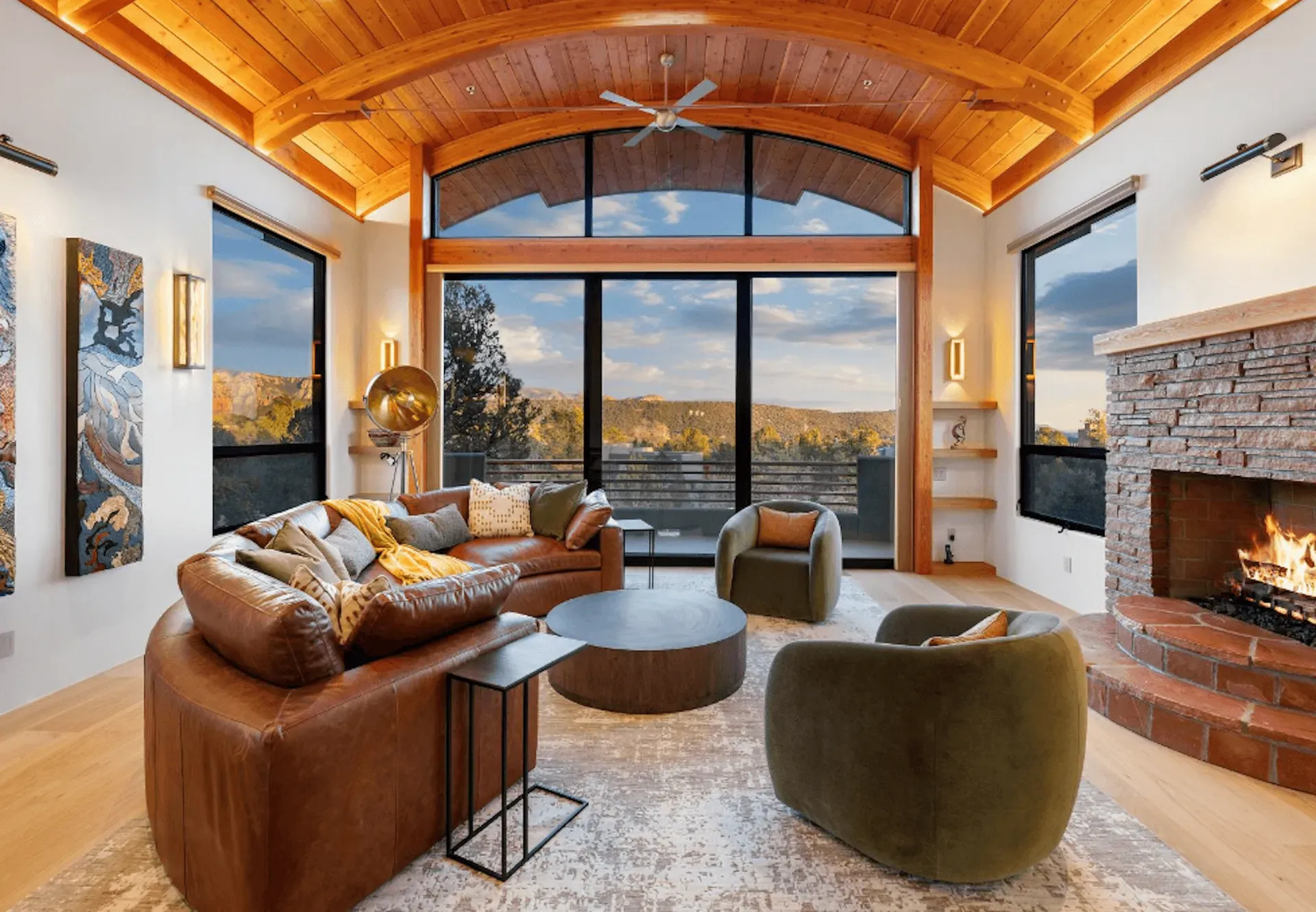 A living room filled with furniture and a fireplace.