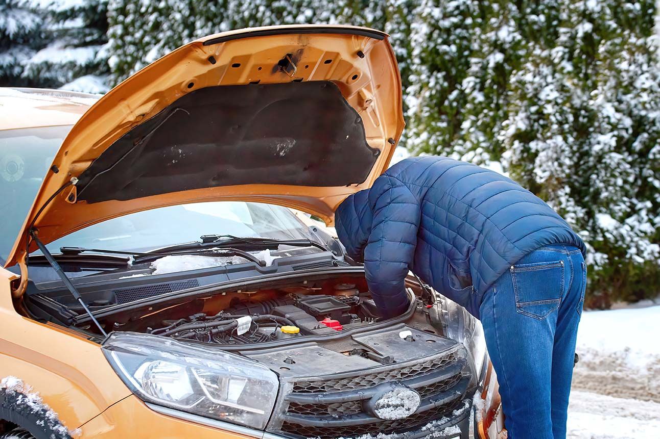 Car won't start and is stranded, owner is trying to figure out the problem.