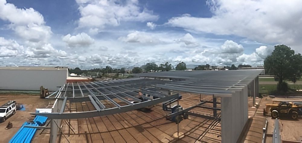 An Aerial View Of A Building Under Construction On A Cloudy Day — Jakes Steel & Welding in East Arm, NT