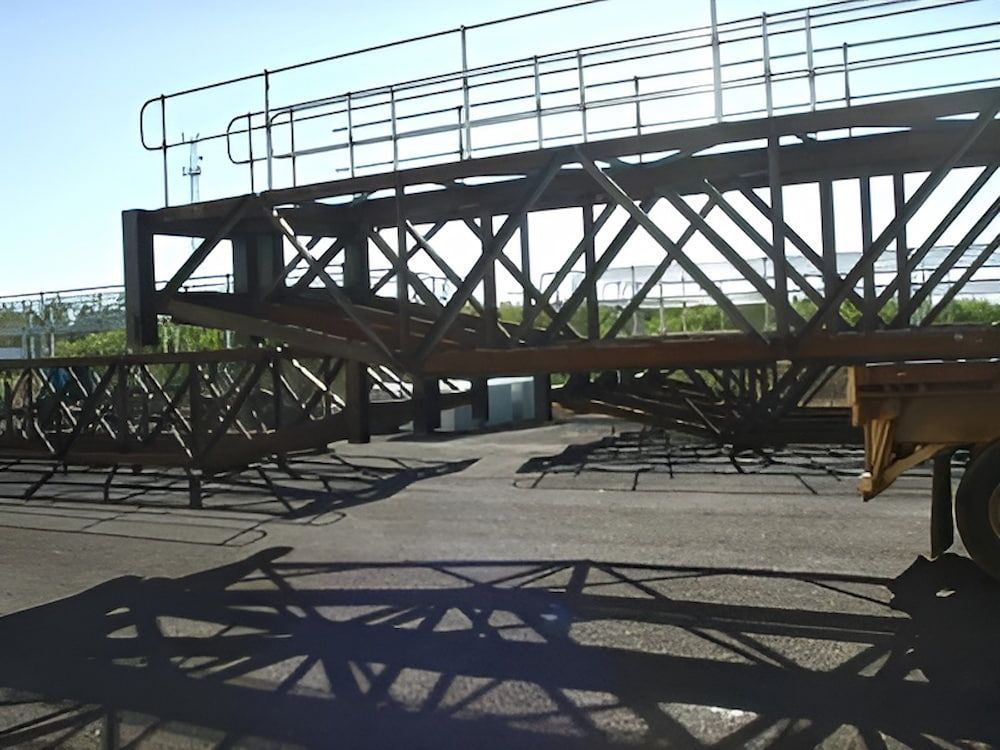 A Shadow Of A Bridge Is Cast On The Ground — Jakes Steel & Welding in East Arm, NT