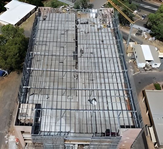An Aerial View Of A Large Building Under Construction — Jakes Steel & Welding in East Arm, NT