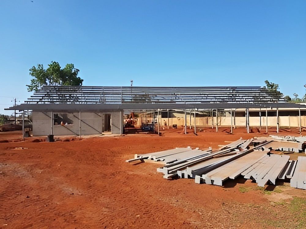 A Building Under Construction In A Dirt Field — Jakes Steel & Welding in East Arm, NT