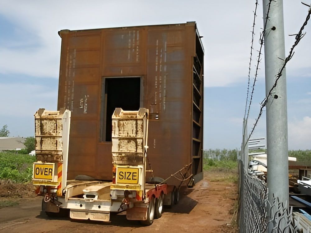 A Truck With A Sign On The Back That Says Over Size — Jakes Steel & Welding in East Arm, NT