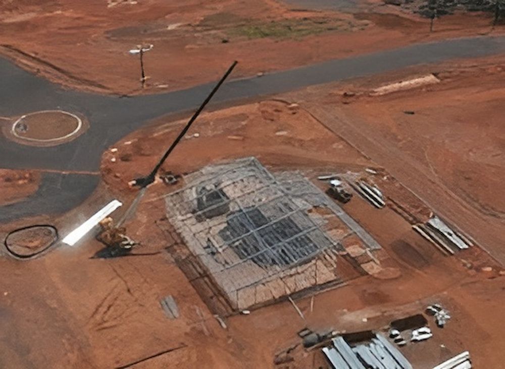 An Aerial View Of A Construction Site With A Large Crane — Jakes Steel & Welding in East Arm, NT