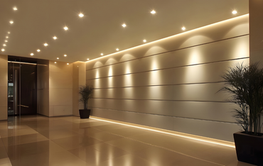 Modern hallway with warm recessed lighting installed in ceiling
