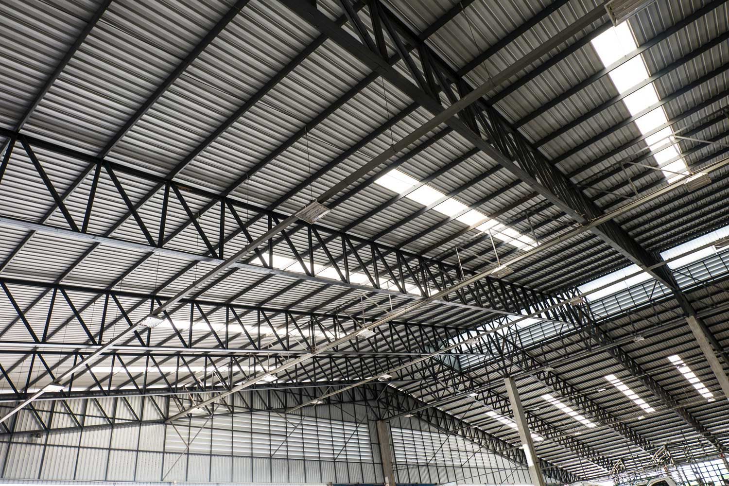 Steel roof structure with corrugated metal panels and skylights. Steel roof structure with corrugated metal panels and skylights.