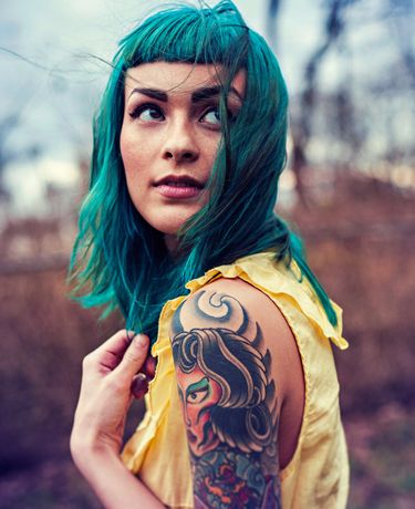 Lady with Beautiful Tattoo — South Bend, IN — Electric Rose Inc