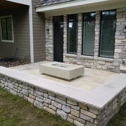 Custom backyard fire pit design in Loretto MN enhancing outdoor living areas with a cozy focal point