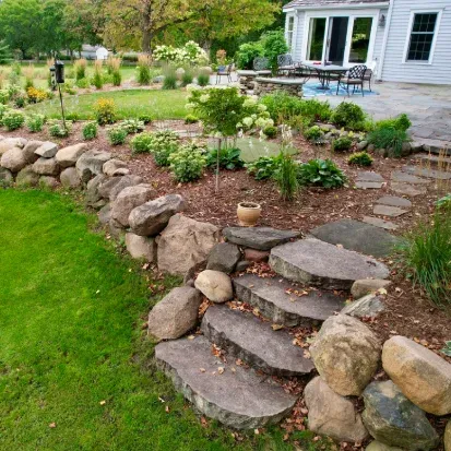 Custom landscaping services in Orono creating functional and beautiful outdoor living spaces for residential properties
