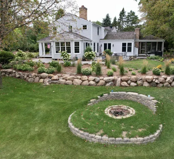 landscape debris cleanup in Loretto MN restoring neat and well maintained yard appearance