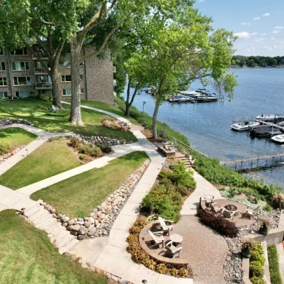 landscape design in Wayzata enhancing curb appeal with plants hardscapes and tailored outdoor layouts