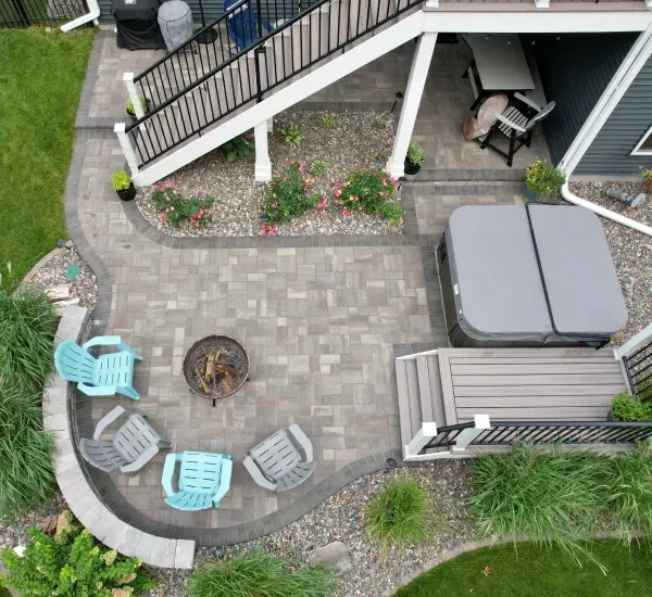 Custom patio installation in Loretto MN creating durable and stylish outdoor living spaces for residential properties
